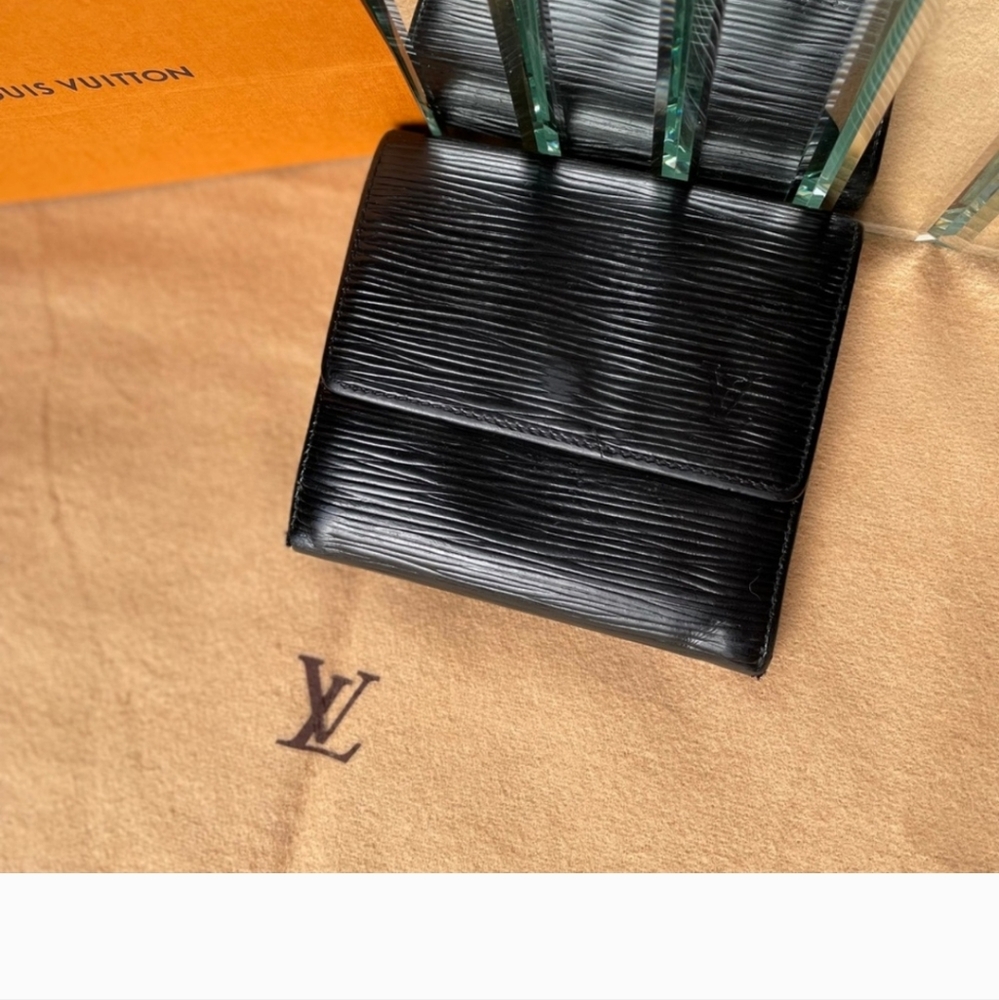 Louis Vuitton Epi Matte Leather Elise bi fold wallet in black.